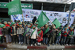 Palestinian children participate during a meeting to celebrate in the anniversary of Islamic movement foundation in the southern Gaza Strip town of Rafah on December 09, 2010. Which indicate The anniversary of the launch Hamas on December 14. Photo by Abed Rahim Khatib
